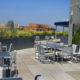 901 NY Ave. Roof Top Terrace is a 3,263 SF roof top terrace addition. The penthouse renovation consists of upgrades to the elevator lobby, restrooms and pantry. These interior upgrades include updated lighting, a storefront door, wall and floor tile, stone stair treads, and pantry millwork. The terrace renovations feature modifications to the existing terrace canopy area and expansion of the terrace seating area. These exterior upgrades include new stone and wood pavers, installation of a pantry roll-up door, exterior lighting upgrades, and refinishing of the exterior façade. Location: Washington, DC Owner: Boston Properties Architect: SKB Architecture & Design Structural Engineer: SK&A Structural Engineers MEP Engineer: WFT Engineering, Inc. Square Footage: 3,263